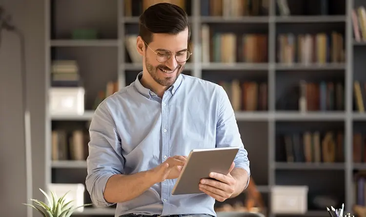 Man looking at a tablet