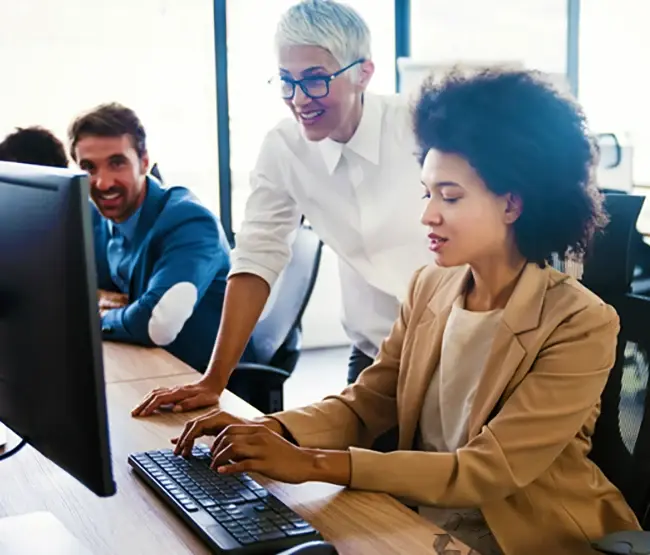 people looking at screen and smiling