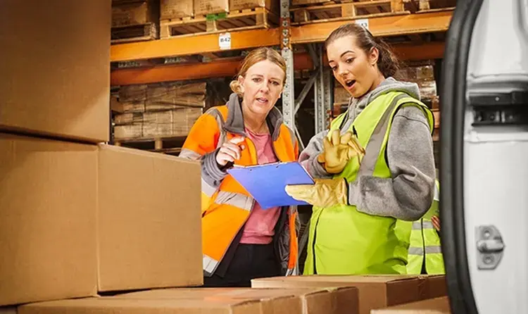 warehouse-workers-receiving-parcels-in-a-warehouse