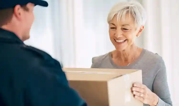 older lady receiving a package